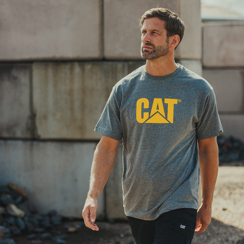 Man wearing a grey Caterpillar t-shirt